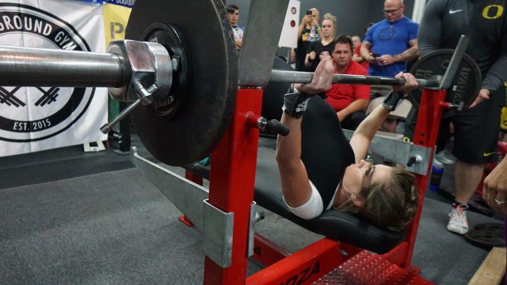 FitBliss coach Natalie Suaz benching in competition